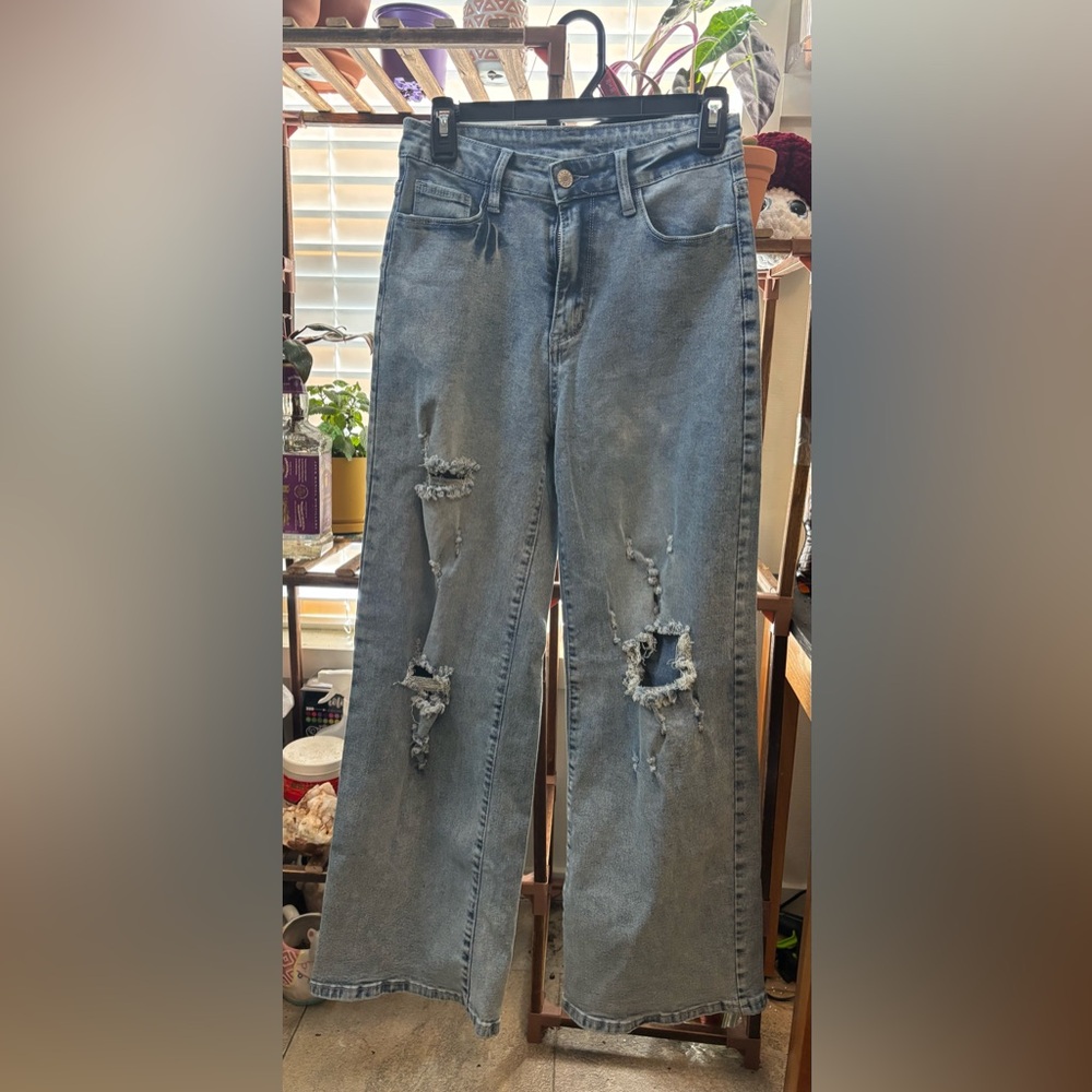 Distressed Light Blue Denim Jeans